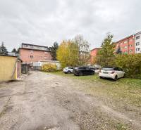 Parking lot with cars on Bratislavská Street in Žilina near the offices.