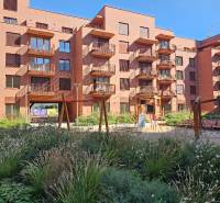 Residential complex in Bratislava - Ružinov on Košice Street with a playground and greenery.