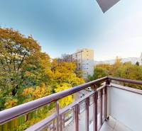 View from the balcony of a 2-room apartment overlooking greenery in Bratislava - Staré Mesto, Krížna.