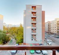 View from a 2-room apartment in Bratislava on Krížna Street with a cityscape.