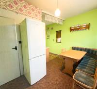 Dining area with a sofa set and table in a 3-room apartment.