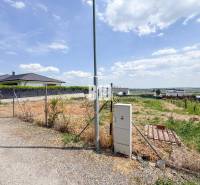 A plot for residential use in Štitáre with a view of the surroundings and an access road.