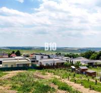 The area in Štitáre with residential plots, surrounded by family houses and nature.