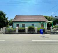 A family house on Záblatská Street in Trenčín with a garden behind the fence.