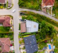Aerial view of a family house in Trenčín on Záblatská Street, surrounded by greenery.