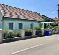 A family house on Záblatská Street in Trenčín with a classic roof and blue facade.