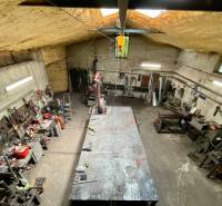 Workshop in a family house with tools and a workbench, Záblatská Street, Trenčín.