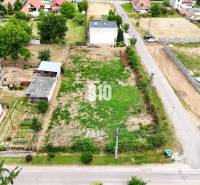 Aerial view of residential plots in Bardoňovo with surrounding houses and gardens.