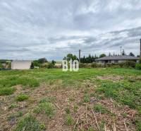 Residential plots in Bardoňovo with views of the surrounding countryside and nearby houses.