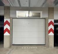 Garage parking with a gate in the building on Karpatská Street in Poprad.