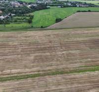 Agricultural and forest land in Nová Ves nad Váhom with a view of the local landscape.