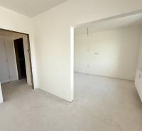 Interior of a 2-room apartment with white walls and prepared outlets for electrical installation.