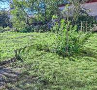 The garden at the family house in Dobrá Voda on Dobrá Voda Street with mowed grass.