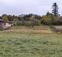 Exterior in the area of Velký Bab, suitable for residential plots, with houses and nature.