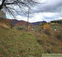 Autumn in the Gardens of Hlboké nad Váhom with a view of colorful hills and forests.