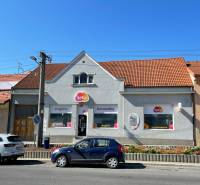 A family house on M. A. Beňovského Street in Vrbové with a shop on the ground floor.