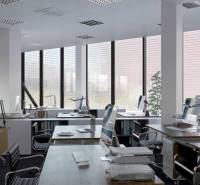 Offices with computers, chairs, and large windows, floor with wooden decor.