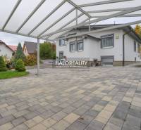 A paved area with a shelter at a family house in Domaniža.