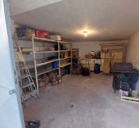 Storage space in a family house with shelves for storage in Dlhá Ves.