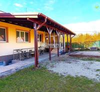 Entrance hall of a 3-room apartment with a large mirror and glass doors.