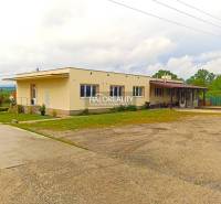 Outdoor terrace at a 3-room apartment in Štefanová with chairs and bicycles.