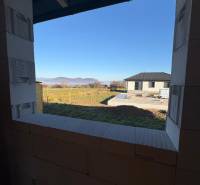 The view from the family house in Vyšná Šebastová of the nature and the neighboring house.