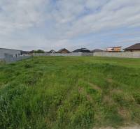 Plots - residential in Čaňa, fenced, with grassy area suitable for building houses.