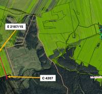 Aerial view of agricultural and forest lands of the village Štrba with marked parcels.