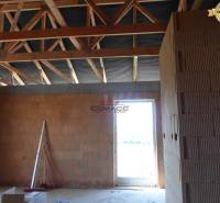 Construction of a family house on Nové Mesto nad Váhom street with brick walls and ceiling.