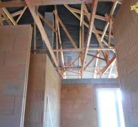 The interior construction of a family house on Nové Mesto nad Váhom street with wooden beams.