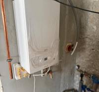 Boiler room of a family house in Stará Kremnička with a wall-mounted gas boiler.