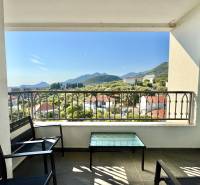 A balcony in a one-room apartment with a view of the mountains in Bar.