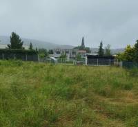 A plot of land in Limbach suitable for living, bordered by a fence, with a view of nature.