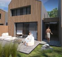 Family house in Turecká with wooden cladding, terrace, garden furniture, exterior.