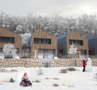 A family house in Turecká, snowy environment, children playing in the snow in front of the house.