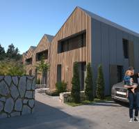 Family houses in Turecká with wooden decor, stone fence, and a parked car.