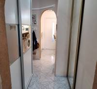 Bathroom in a 3-room apartment with tiles and a mirrored cabinet.