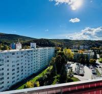 View from the balcony of apartment buildings and nature in Partizánske on Nádražná Street.