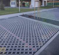 Parking lot with paving and greenery in Poprad near a 2-room apartment.