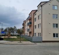 Apartment building with a children's playground on Pezinská Street in Malacky, ideal studio apartment.
