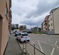 Parking lot near apartment buildings on Pezinská Street in Malacky.