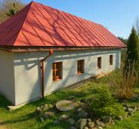 A family house with a pitched roof on Štiavnické Bane street in the town of Štiavnické Bane.