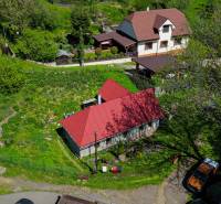 Aerial view of a family house surrounded by greenery in Štiavnické Bane on Štiavnická Street.