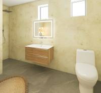 Bathroom in a family house with a washing machine, shower, and sink, floor with wooden decor.