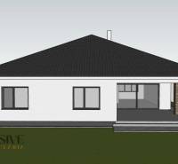 A family house in Bajč with a white facade and a structured roof.