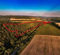 Agricultural and forest land near Rokycany, forest and fields with a red outline.