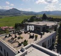 Rajecké Teplice, M. R. Štefánika: A building with a spacious terrace and a view of the mountains.