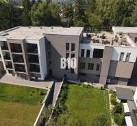 Apartment complex on M. R. Štefánik Street in Rajecké Teplice surrounded by greenery.