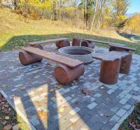 In Martin na Stráňach, a little way from the cottage, you will find an outdoor fireplace with wooden benches.
