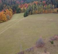 Autumn landscape in the Recreational Grounds in Lazy pod Makytou at Čertov, surrounded by colorful forests.